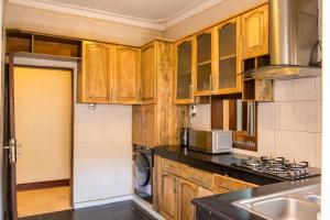 Fotografie z fotogalerie ubytování AILAS RETREAT , LUXURIOUS Apartment v destinaci Namirembe