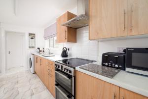 Η κουζίνα ή μικρή κουζίνα στο Cooper stay - perfect for contractors