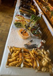a table with many different types of food on it at Partyraum Waldeslust Preis nach Anfrage in Oelde +17 photos