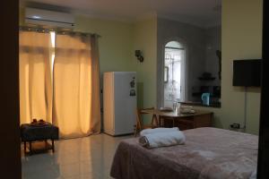 Ένα ή περισσότερα κρεβάτια σε δωμάτιο στο Dolphin suites apartment