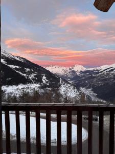 a view of a snow covered mountain with a river at NEW Luxury Chalet Sapins - PRIVATE POOL- Mountains VIEW - Family & Comfort - SPECIAL LAUNCH OFFER in Sainte-Foy-Tarentaise