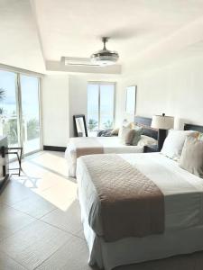 Ένα ή περισσότερα κρεβάτια σε δωμάτιο στο Bay View Grand Marina 4C