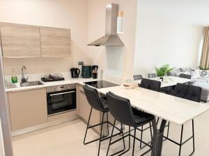 Kuchyň nebo kuchyňský kout v ubytování Minissy luxury Serviced Apartment