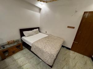 Postel nebo postele na pokoji v ubytování Hotel Seven View