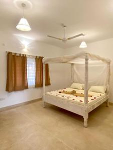 Postel nebo postele na pokoji v ubytování Blue Diamond Villa Watamu + 29 fotografií