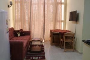 Μια τηλεόραση ή/και κέντρο ψυχαγωγίας στο Dolphin suites apartment