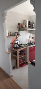 Kuchyň nebo kuchyňský kout v ubytování Stanza luminosa e panoramica