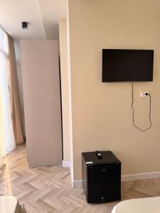 TV a/nebo společenská místnost v ubytování Randori Rest