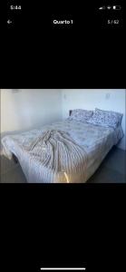 a picture of a bed in a room at Lavandário do Sertão in Gonçalves +3 photos
