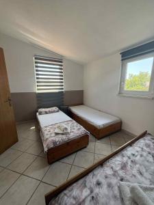 Posteľ alebo postele v izbe v ubytovaní Sandra + 20 fotografií