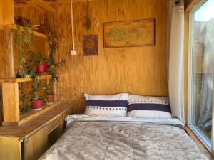 Postel nebo postele na pokoji v ubytování Refugio nativo