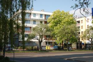 an apartment building on the side of a street at TLA Kolberg in Kołobrzeg