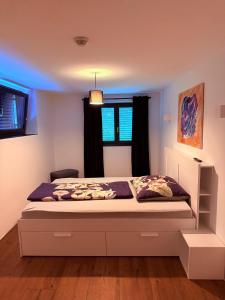 Postel nebo postele na pokoji v ubytování Blaue Lagune-Ferien mit Stil