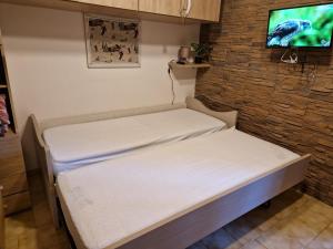 Postel nebo postele na pokoji v ubytování Casa Giovy