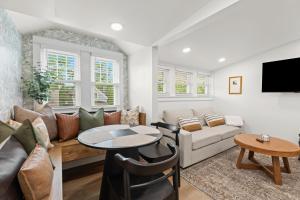 a living room with a couch and a table at Ardmore in Ferndale
