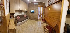 TV a/nebo společenská místnost v ubytování Casa Giovy