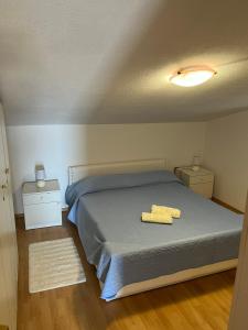 Katil atau katil-katil dalam bilik di Apartman Elza