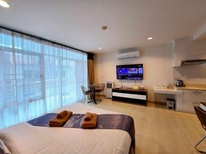 Μια τηλεόραση ή/και κέντρο ψυχαγωγίας στο The Beach Bangsaen Condo 327-23
