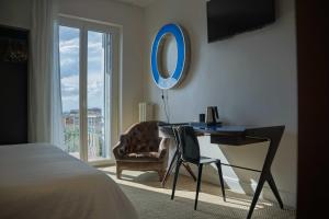 Postel nebo postele na pokoji v ubytování Boutique Hotel Trieste - Adults Only