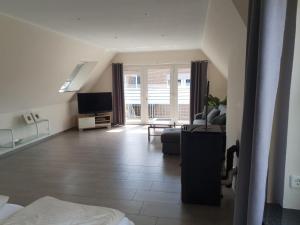 Χώρος καθιστικού στο Fewo enjoy Stadtlohn Münsterland +2 φωτογραφίες