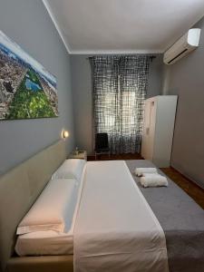 Postel nebo postele na pokoji v ubytování Crown Guest House