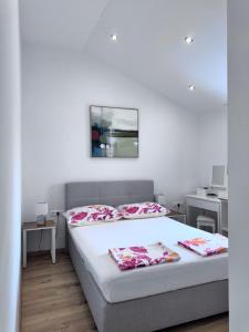 Ένα ή περισσότερα κρεβάτια σε δωμάτιο στο Panorama House