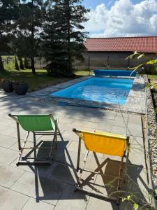 Afbeelding uit fotogalerij van Koniec Świata dom 84m2 z balią i basenem na wyłączność in Mikołajki