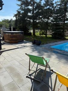 Afbeelding uit fotogalerij van Koniec Świata dom 84m2 z balią i basenem na wyłączność in Mikołajki