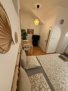 Postel nebo postele na pokoji v ubytování Studio Allure 1