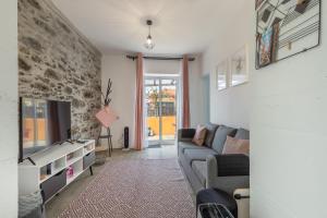 Posezení v ubytování Scenic Home with Panoramic Sea & Mountain Views in São Vicente