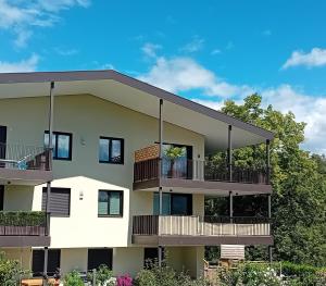 an image of an apartment building with balconies at FeWo Passo-Palade in Tesimo