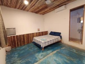 En eller flere senge i et værelse på Hotel Casa Maguey + 7 billeder