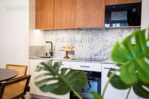 Dapur atau dapur kecil di Aparthotel ZATOR Retro 66 jacuzzi +43 gambar