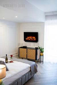 Postel nebo postele na pokoji v ubytování Aparthotel ZATOR Glam 52 jacuzzi
