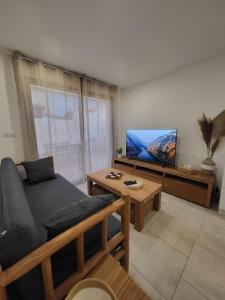 TV a/nebo společenská místnost v ubytování Ubud