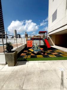 a playground on the roof of a building at Apartamento BELÉM COP 30 in Belém