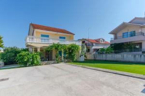 an empty driveway in front of a house at House Marina in Zaboric