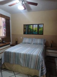 Ένα ή περισσότερα κρεβάτια σε δωμάτιο στο Cómodo apartamento en Naguanagua