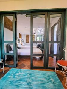 Postel nebo postele na pokoji v ubytování Casa Silva - Hotel Cafe