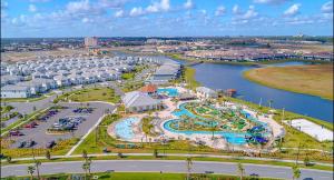 an aerial view of a resort with a water park at 2 Bedrooms Apartment in Storey Lake in Kissimmee