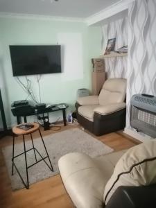 TV a/nebo společenská místnost v ubytování Cheerful home