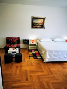 Postel nebo postele na pokoji v ubytování Apartments Mara Cres