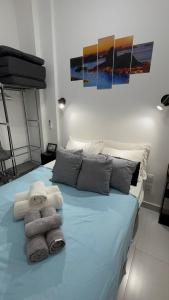 Cama o camas de una habitación en Estilo e Conforto da Lapa