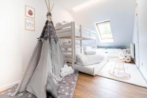 Postel nebo postele na pokoji v ubytování Disneyland-Paris, 7 pers, parking privé, Wi-Fi