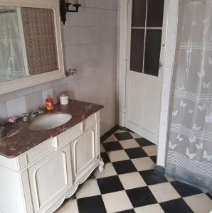 a bathroom with a sink and a shower at Estancia Saldañil in Villa Los Aromos +13 photos
