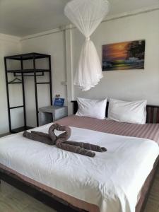 Postel nebo postele na pokoji v ubytování Lanta Rabbit Rooms + 54 fotografií