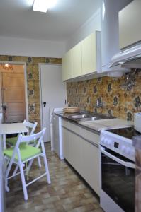 Kuchyň nebo kuchyňský kout v ubytování Casa da Poesia