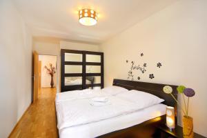 Postel nebo postele na pokoji v ubytování Apartment Medvědín 331/110 + 19 fotografií