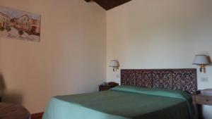 Letto o letti in una camera di illicini stabilimento balneare e albergo