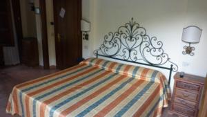 Letto o letti in una camera di illicini stabilimento balneare e albergo
